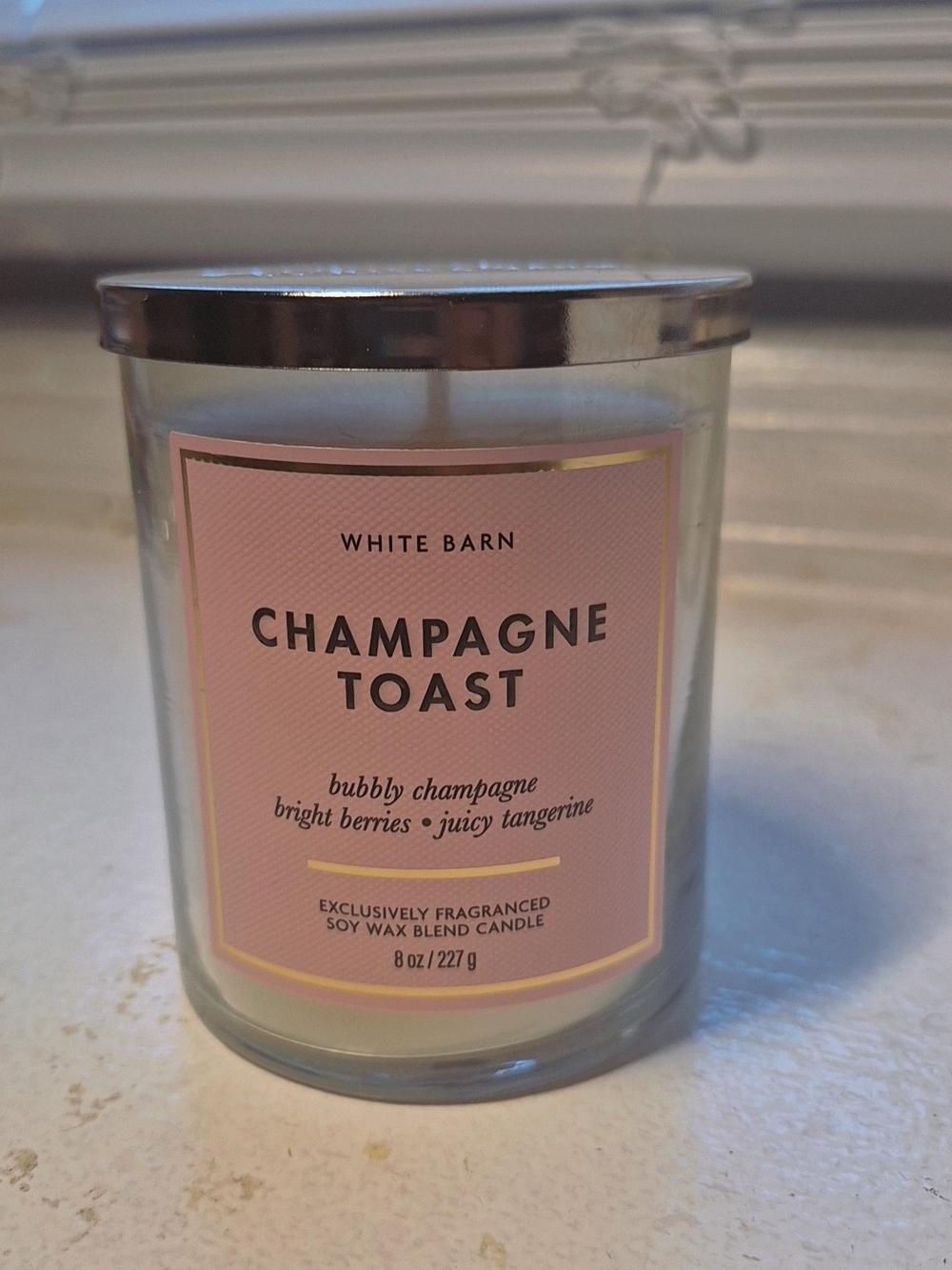 White Barn Champagne Toast Candle - Pink Label with Silver Lid